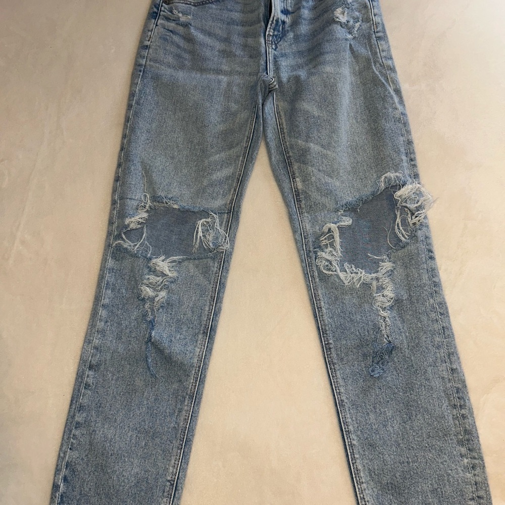 Women’s Distressed Light Wash Straight Leg Jeans